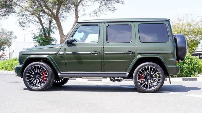 Новый Mercedes-Benz G-Class AMG 63 AMG II (W465) Рестайлинг, 4.0 л, 2025 в Дубае от Najem Motors Зеленый цвет. Европейская | AUTO.AE