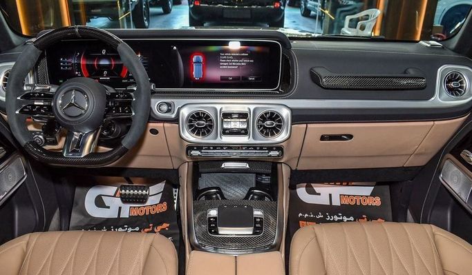 Новый Mercedes-Benz G-Class AMG 63 AMG II (W465) Рестайлинг, 4.0 л, 2025 в Дубае от Najem Motors Серый цвет. Европейская | AUTO.AE