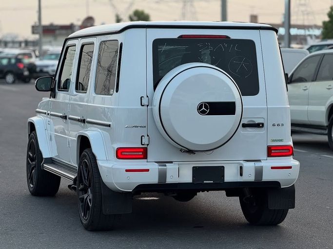 Used Mercedes-Benz G-Class AMG 63 AMG II (W463), 4.0 l, 2022 in Dubai by Lakhani Motors, White color. Japanese Specs | AUTO.AE