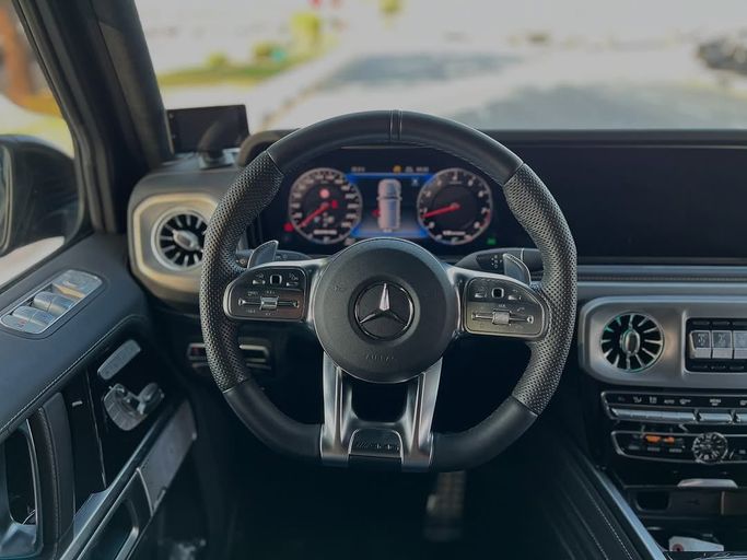 Подержанный Mercedes-Benz G-Class AMG 63 AMG II (W463), 4.0 л, 2022 в Дубае от Lakhani Motors Черный цвет. Японская | AUTO.AE