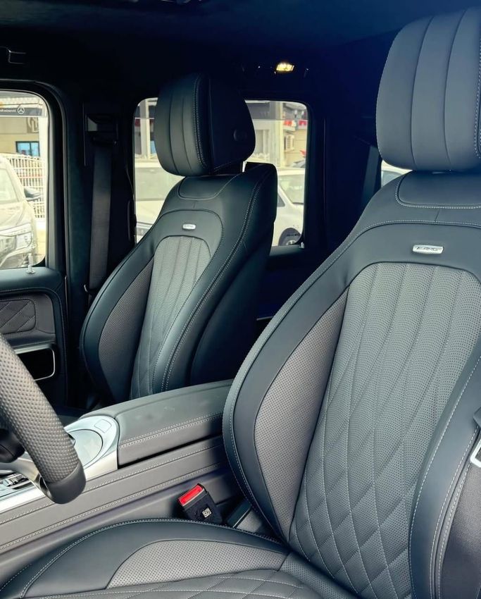 Used Mercedes-Benz G-Class AMG 63 AMG II (W463), 4.0 l, 2023 in Dubai by Lakhani Motors, White color. Japanese Specs | AUTO.AE