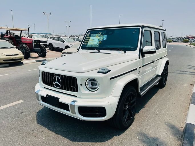 Подержанный Mercedes-Benz G-Class AMG 63 AMG II (W463), 4.0 л, 2021 в Дубае от Lakhani Motors Белый цвет. Японская | AUTO.AE