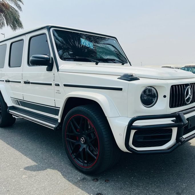 Подержанный Mercedes-Benz G-Class AMG 63 AMG II (W465) Рестайлинг, 4.0 л, 2024 в Дубае от Lakhani Motors Белый цвет. Японская | AUTO.AE