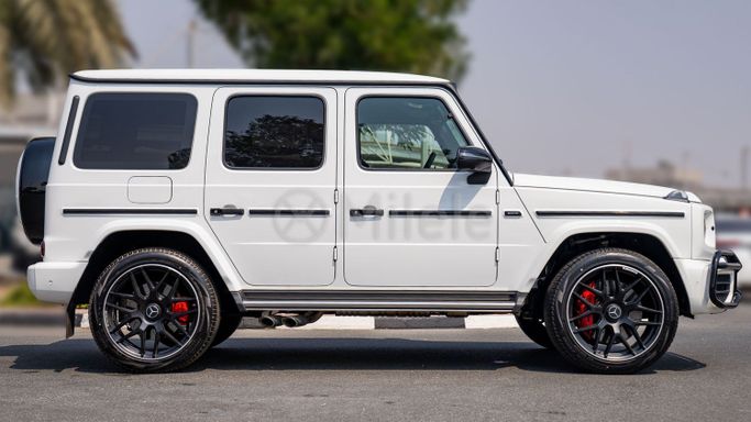 Подержанный Mercedes-Benz G-Class AMG 63 AMG II (W463), 4.0 л, 2022 в Дубае от Milele Белый цвет. Other | AUTO.AE