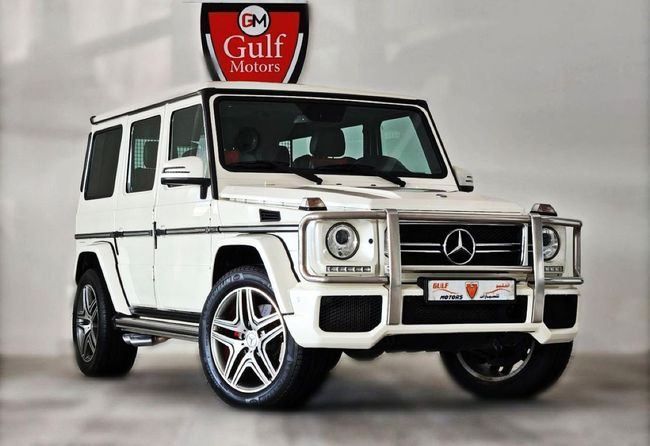 Used Mercedes-Benz G-Class AMG 63 AMG I (W463) Facelift 2, 5.5 l, 2013 in Dubai by Gulf Motors, White color. GCC Specs | AUTO.AE