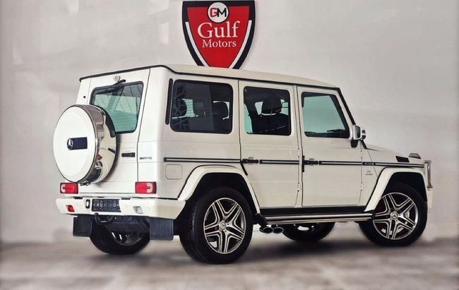 Used Mercedes-Benz G-Class AMG 63 AMG I (W463) Facelift 2, 5.5 l, 2013 in Dubai by Gulf Motors, White color. GCC Specs | AUTO.AE