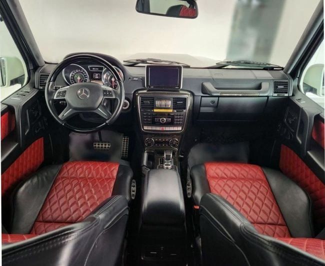 Used Mercedes-Benz G-Class AMG 63 AMG I (W463) Facelift 2, 5.5 l, 2013 in Dubai by Gulf Motors, White color. GCC Specs | AUTO.AE