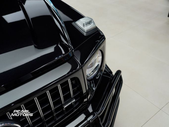Подержанный Mercedes-Benz G-Class AMG 63 AMG II (W463), 4.0 л, 2023 в Дубае от Pearl Motors Черный цвет. GCC | AUTO.AE