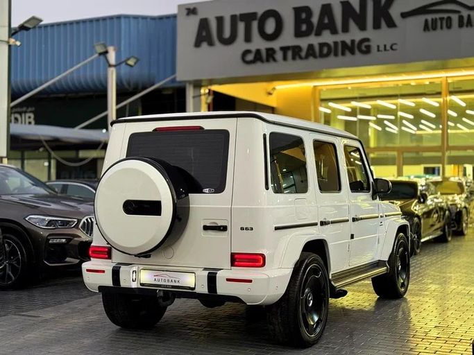 Подержанный Mercedes-Benz G-Class AMG 63 AMG II (W463), 4.0 л, 2022 в Дубае от Auto Bank Motors Белый цвет. Корейская | AUTO.AE