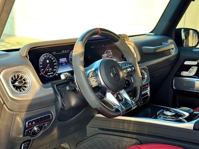 Used Mercedes-Benz G-Class AMG 63 AMG II (W463), 4.0 l, 2023 in Dubai by Auto Bank Motors, Red color. European Specs | AUTO.AE