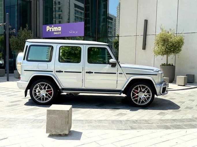 Used Mercedes-Benz G-Class AMG 63 AMG II (W463), 4.0 l, 2021 in Dubai by Auto Bank Motors, White color. GCC Specs | AUTO.AE