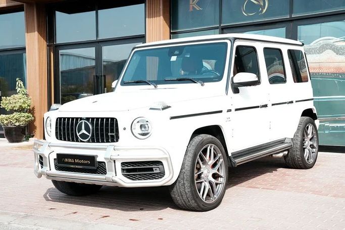 Подержанный Mercedes-Benz G-Class AMG 63 AMG II (W463), 4.0 л, 2021 в Дубае от 8 Ba Motors Белый цвет. GCC | AUTO.AE
