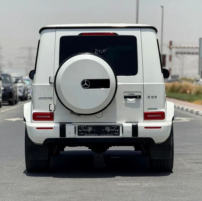 Подержанный Mercedes-Benz G-Class AMG 63 AMG II (W463), 4.0 л, 2021 в Дубае от Mirza Automobile FZE Белый цвет. Японская | AUTO.AE