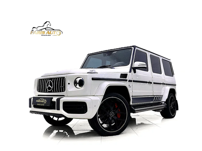 Подержанный Mercedes-Benz G-Class AMG 63 AMG I (W463) Рестайлинг 3, 5.5 л, 2017 в Дубае от Al Faris Motors Белый цвет. GCC | AUTO.AE