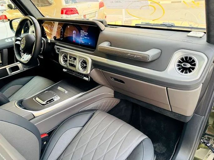 Подержанный Mercedes-Benz G-Class AMG 63 AMG II (W465) Рестайлинг, 4.0 л, 2025 в Дубае от Mirza Automobile FZE Зеленый цвет. Японская | AUTO.AE