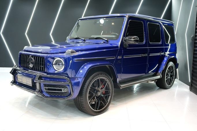 Used Mercedes-Benz G-Class AMG 63 AMG II (W463), 4.0 l, 2022 in Dubai by Sanam Cars, Blue color. GCC Specs | AUTO.AE