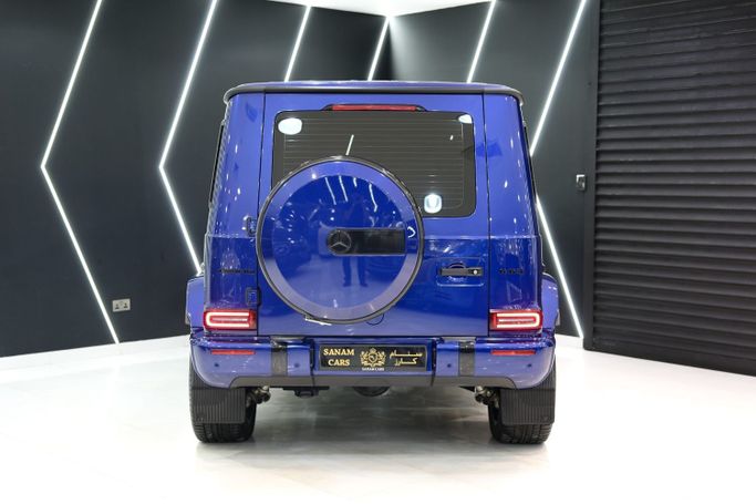 Used Mercedes-Benz G-Class AMG 63 AMG II (W463), 4.0 l, 2022 in Dubai by Sanam Cars, Blue color. GCC Specs | AUTO.AE
