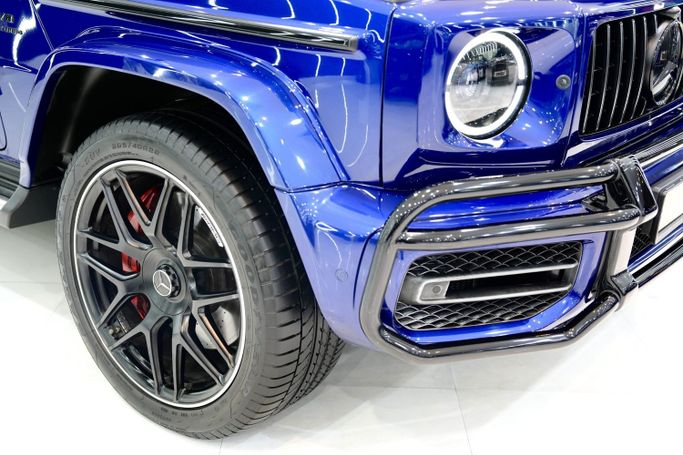Used Mercedes-Benz G-Class AMG 63 AMG II (W463), 4.0 l, 2022 in Dubai by Sanam Cars, Blue color. GCC Specs | AUTO.AE