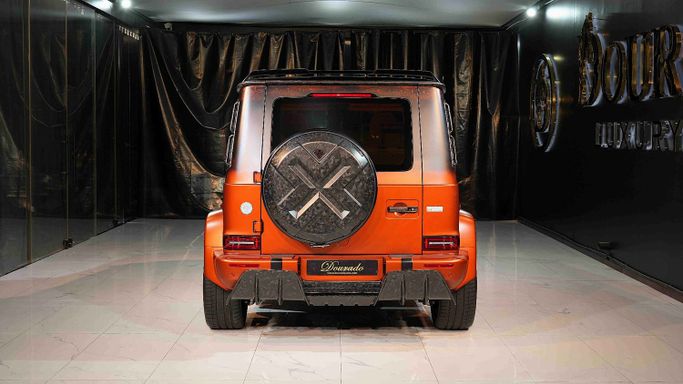 New Mercedes-Benz G-Class AMG Onyx Concept G7X II (W463), 4 l, 2023 in Dubai by Dourado Luxury Car, Orange color. European Specs | AUTO.AE