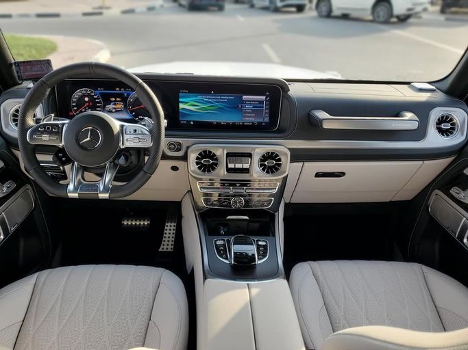 Used Mercedes-Benz G-Class AMG 63 AMG II (W463), 4.0 l, 2023 in Dubai by Japan Motors, White color. Japanese Specs | AUTO.AE