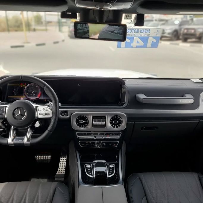 Used Mercedes-Benz G-Class AMG 63 AMG II (W463), 4.0 l, 2023 in Dubai by Japan Motors, White color. Japanese Specs | AUTO.AE