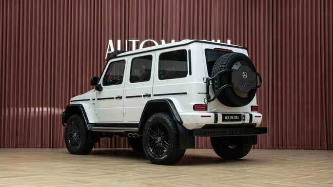 Подержанный Mercedes-Benz G-Class AMG 63 4x4 Squared II (W463), 4.0 л, 2023 в Дубае от Automobili Motors Белый цвет. GCC | AUTO.AE