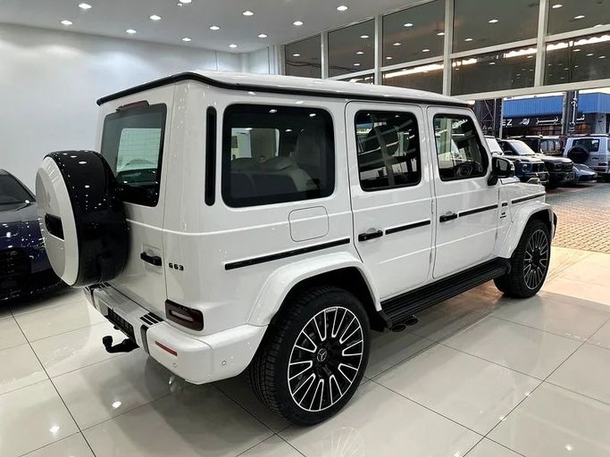 Новый Mercedes-Benz G-Class AMG 63 AMG II (W465) Рестайлинг, 4.0 л, 2025 в Дубае от GTS Motors Белый цвет. Европейская | AUTO.AE