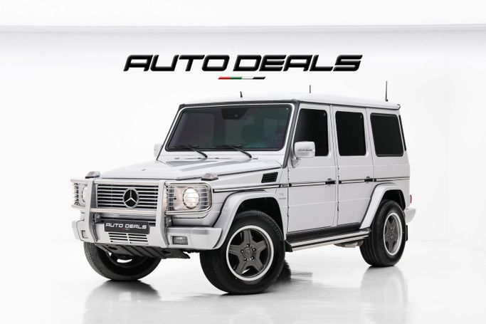 Подержанный Mercedes-Benz G-Class AMG 55 AMG I (W463), 5.4 л, 2005 в Дубае от AUTO DEALS Серебристый цвет. Японская | AUTO.AE