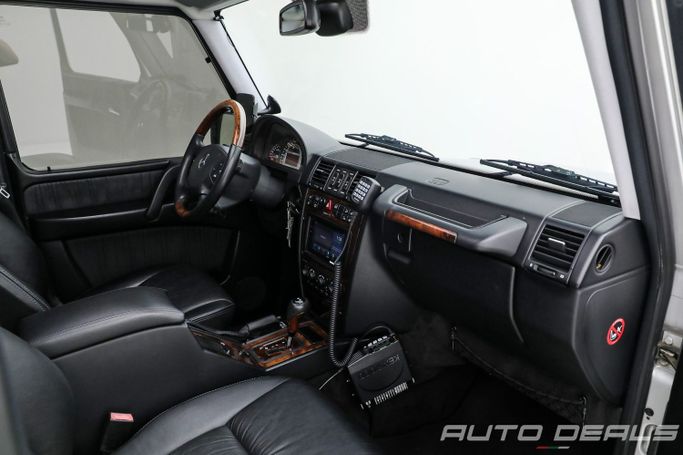 Подержанный Mercedes-Benz G-Class AMG 55 AMG I (W463), 5.4 л, 2005 в Дубае от AUTO DEALS Серебристый цвет. Японская | AUTO.AE