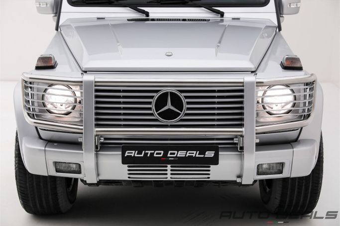 Подержанный Mercedes-Benz G-Class AMG 55 AMG I (W463), 5.4 л, 2005 в Дубае от AUTO DEALS Серебристый цвет. Японская | AUTO.AE