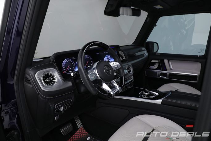 Подержанный Mercedes-Benz G-Class AMG 63 AMG II (W463), 4.0 л, 2021 в Дубае от AUTO DEALS Синий цвет. Европейская | AUTO.AE