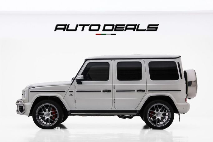 Подержанный Mercedes-Benz G-Class AMG 63 AMG II (W463), 4.0 л, 2021 в Дубае от AUTO DEALS Белый цвет. GCC | AUTO.AE