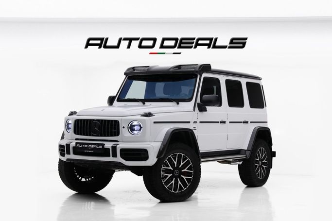 Новый Mercedes-Benz G-Class AMG 63 4x4 Squared II (W463), 4.0 л, 2023 в Дубае от AUTO DEALS Белый цвет. Европейская | AUTO.AE