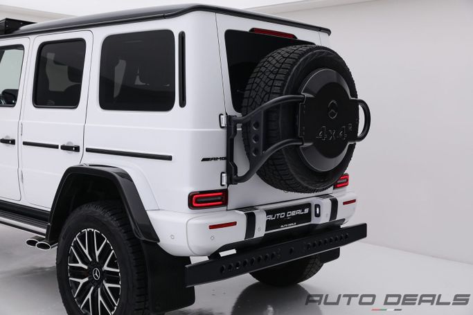 Новый Mercedes-Benz G-Class AMG 63 4x4 Squared II (W463), 4.0 л, 2023 в Дубае от AUTO DEALS Белый цвет. Европейская | AUTO.AE