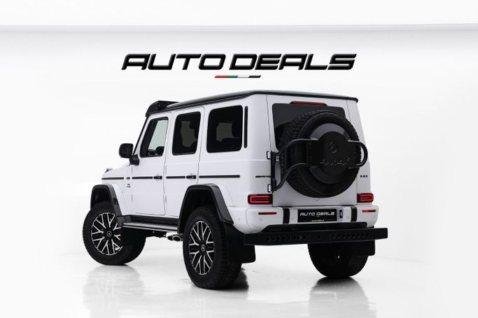 Новый Mercedes-Benz G-Class AMG 63 4x4 Squared II (W463), 4.0 л, 2023 в Дубае от AUTO DEALS Белый цвет. Европейская | AUTO.AE