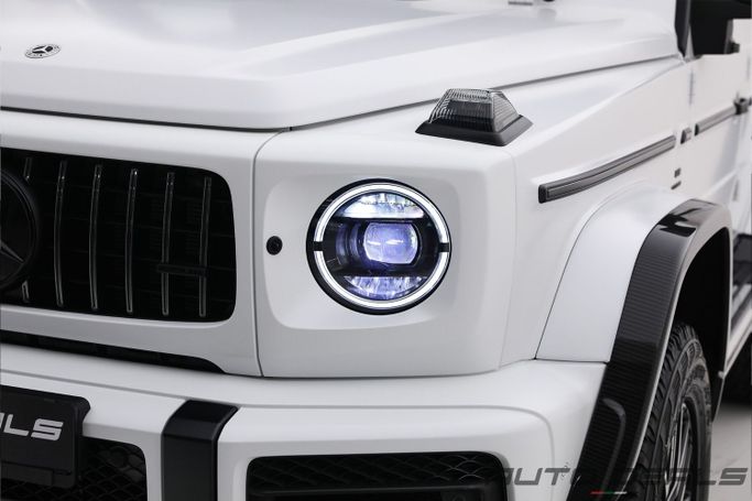 Новый Mercedes-Benz G-Class AMG 63 4x4 Squared II (W463), 4.0 л, 2023 в Дубае от AUTO DEALS Белый цвет. Европейская | AUTO.AE