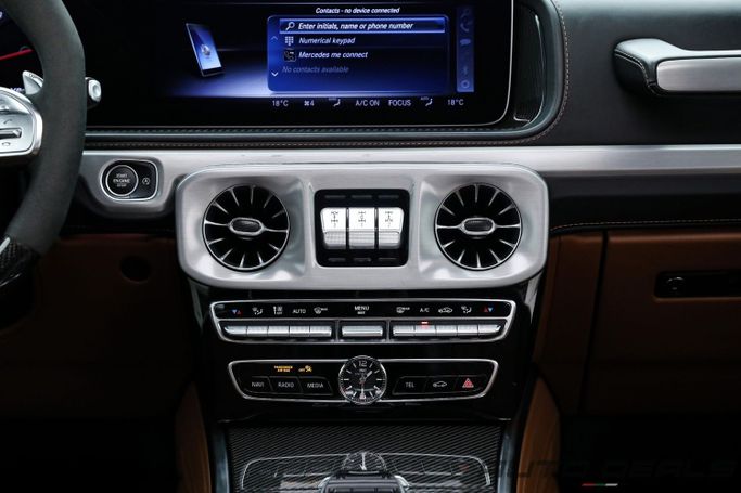 Подержанный Mercedes-Benz G-Class AMG 63 AMG II (W463), 4.0 л, 2021 в Дубае от AUTO DEALS Черный цвет. GCC | AUTO.AE