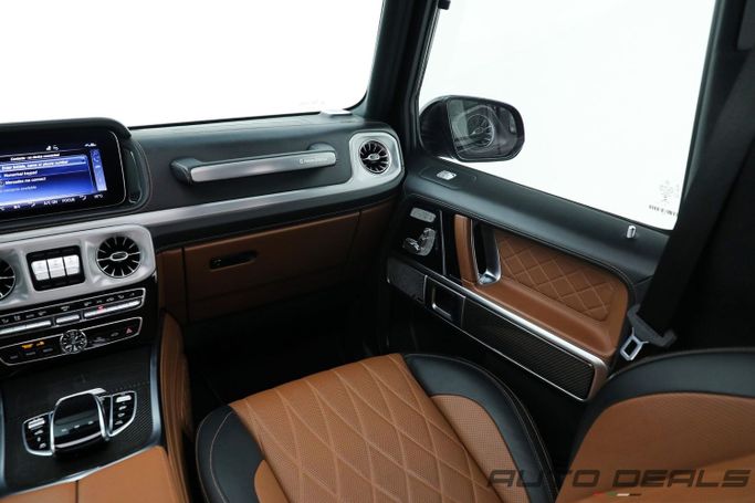 Подержанный Mercedes-Benz G-Class AMG 63 AMG II (W463), 4.0 л, 2021 в Дубае от AUTO DEALS Черный цвет. GCC | AUTO.AE