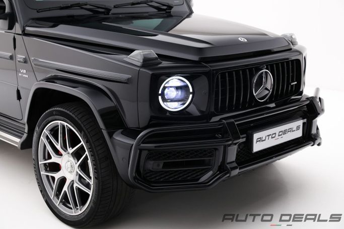 Подержанный Mercedes-Benz G-Class AMG 63 AMG II (W463), 4.0 л, 2021 в Дубае от AUTO DEALS Черный цвет. GCC | AUTO.AE