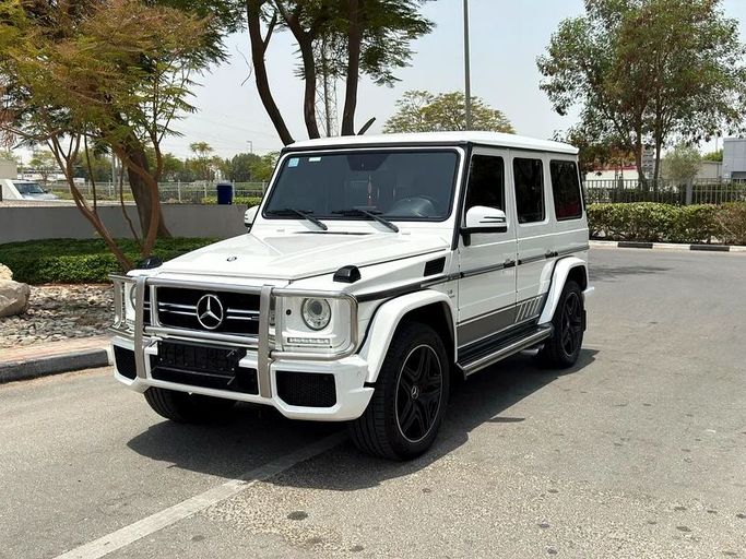 Used Mercedes-Benz G-Class AMG 63 AMG I (W463) Facelift 2, 5.5 l, 2015 in Dubai by Al Ketbi Motors, White color. GCC Specs | AUTO.AE