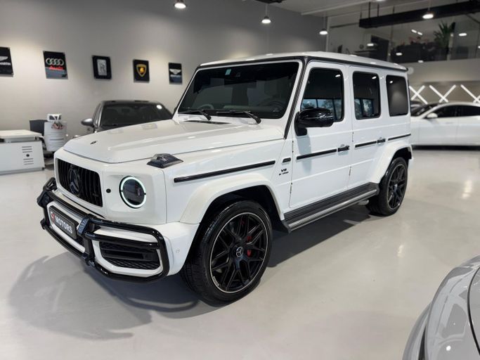 Подержанный Mercedes-Benz G-Class AMG 63 AMG II (W463), 4.0 л, 2021 в Дубае от C7 Motors Белый цвет.  | AUTO.AE | Объявление #257077