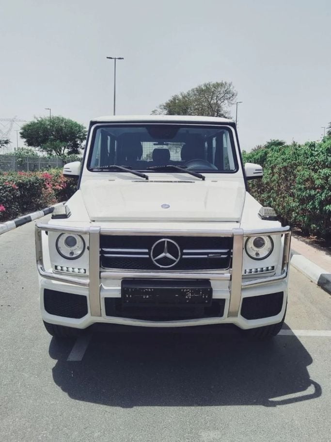 Used Mercedes-Benz G-Class 550 II (W463) Facelift 2, 5.5 l, 2009 in Dubai by Lahbab Motors, White color. Japanese Specs | AUTO.AE