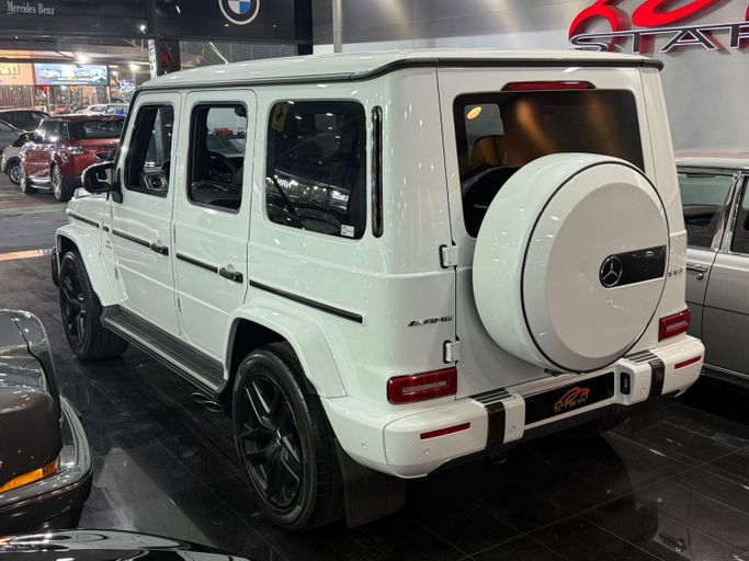 Used Mercedes-Benz G-Class AMG 63 AMG II (W463), 4.0 l, 2022 in Dubai by STAR COLLECTION LLC, White color. Japanese Specs | AUTO.AE