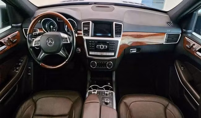 Used Mercedes-Benz GL-Class 500 II (X166), 4.7 l, 2013 in Dubai by Gulf Motors, Brown color. GCC Specs | AUTO.AE