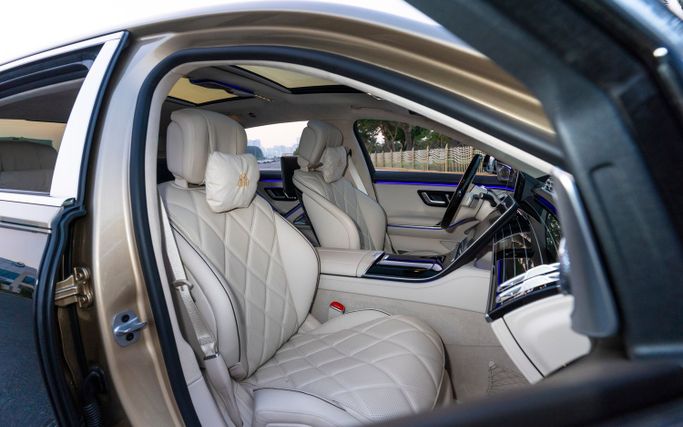 Mercedes-Benz Maybach S-Class 680 II (Z223), 2023 business sedan for rent in Dubai by Macan Luxury Motors, golden color | AUTO.AE