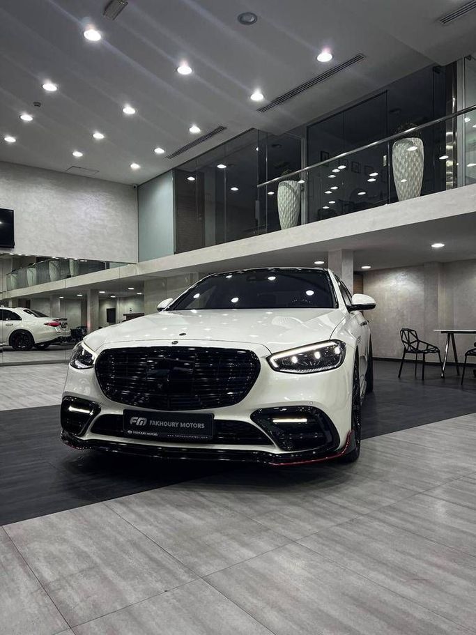 New Mercedes-Benz S-Class AMG IV (W223), 4.0 l, 2022 in Dubai by Fakhoury, White color. European Specs | AUTO.AE