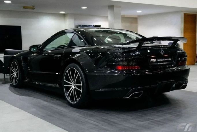 Used Mercedes-Benz SL-Class AMG 65 AMG Black Series II (R230) Facelift 2, 6.0 l, 2009 in Dubai by Fakhoury, Black color. American Specs | AUTO.AE