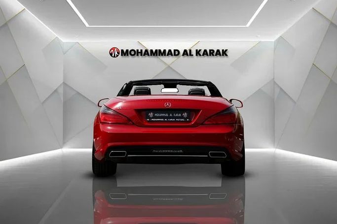 Used Mercedes-Benz SL-Class 350 VI (R231), 3.5 l, 2012 in Dubai by Mohammad Alkarak Motors, Red color. Japanese Specs | AUTO.AE