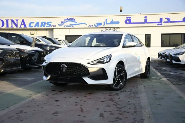 New MG 5 (GT) II, 1.5 l, 2025 in Dubai by AL MADINA CARS FZE, White color. GCC Specs | AUTO.AE