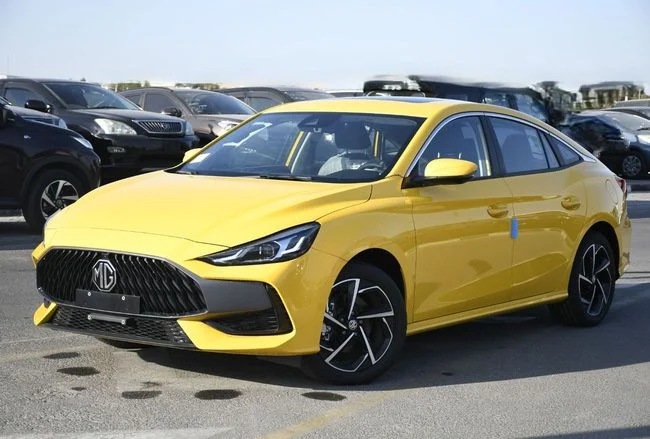 جديدة MG 5 (GT) ثانياً, 1.5 l, 2025 في في دبي من AL MADINA CARS FZE، اللون أصفر. مواصفات الخليج | AUTO.AE